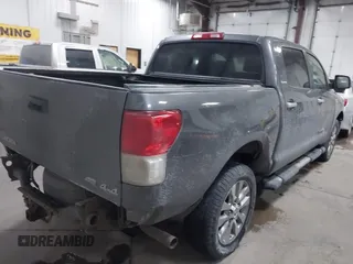 2012 Toyota Tundra 4WD Truck LTD with VIN 5TFHW5F14CX267765, listed as a IAAI auction lot 41345269 with 221,400 mi miles. Bid and sale history available at carsss.com. Image 4.