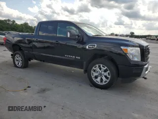 2024 Nissan Titan SV with VIN 1N6AA1FB4RN118355, listed as a Copart auction lot 57669095 with 2,861 mi miles and Salvage title. Bid and sale history available at DreamBid. Image 4.