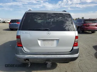1999 Mercedes-Benz M-Class with VIN 4JGAB54E6XA078297, listed as a Copart auction lot 78088564 with 208,288 mi miles and Salvage Title. Bid and sale history available at carsss.com. Image 6.
