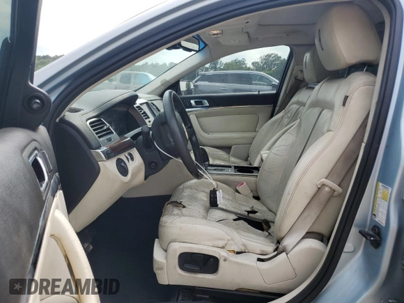 2009 Lincoln MKS with VIN 1LNHM93R59G620803, listed as a Copart auction lot 57283775 with 186,445 mi miles and Salvage title. Bid and sale history available at DreamBid. Image 7.