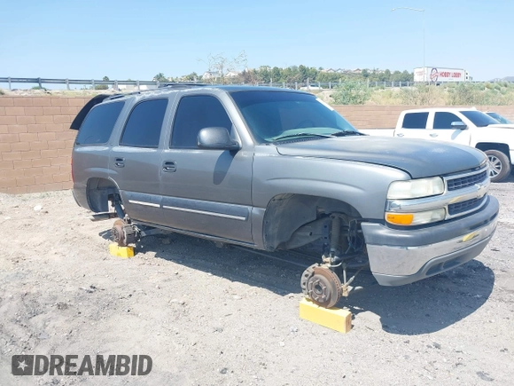 2001 Chevrolet Tahoe LS z VIN 1GNEC13T51J153677, wystawiony jako IAAI lot #42459552 z przebiegiem 201 209 mil mil oraz . Historia ofert i sprzedaży dostępna na DreamBid. Obrazek 1.