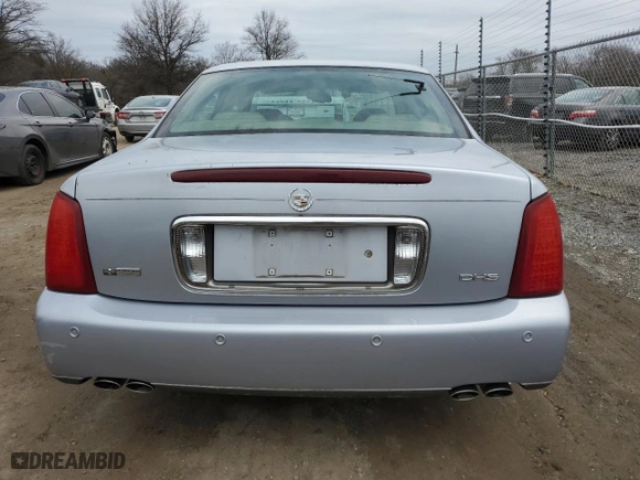 2004 Cadillac DeVille DHS with VIN 1G6KE57YX4U252567, listed as a Copart auction lot 43383555 with 0 mi miles and Salvage Title. Bid and sale history available at carsss.com. Image 6.
