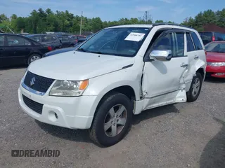 2010 Suzuki Grand Vitara XSport z VIN JS3TE0D48A4100189, wystawiony jako IAAI lot #42500701 z przebiegiem 135 346 mil mil oraz . Historia ofert i sprzedaży dostępna na DreamBid. Obrazek 2.