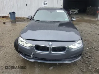 2018 BMW 3 Series 320i xDrive with VIN WBA8A3C52JA067443, listed as a Copart auction lot 59093005 with 69,078 mi miles and Salvage title. Bid and sale history available at DreamBid. Image 5.