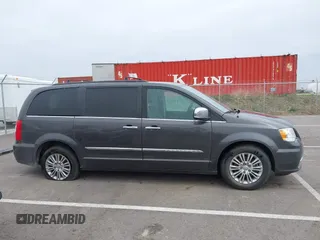 2015 Chrysler Town & Country Touring-L with VIN 2C4RC1CG9FR674238, listed as a IAAI auction lot 41908335 with 138,819 mi miles. Bid and sale history available at carsss.com. Image 14.