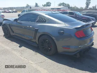 2019 Ford Mustang EcoBoost with VIN 1FA6P8TH5K5181274, listed as a IAAI auction lot 42719275 with 91,605 mi miles and . Bid and sale history available at DreamBid. Image 3.