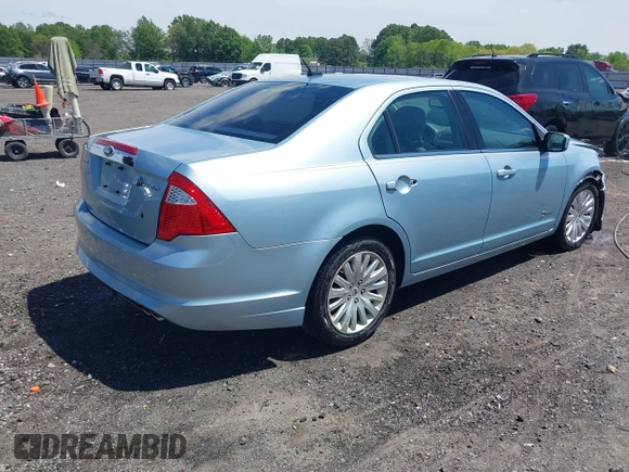 2010 Ford Fusion Hybrid z VIN 3FADP0L33AR385001, wystawiony jako IAAI lot #42074965 z przebiegiem 195 962 mil mil oraz . Historia ofert i sprzedaży dostępna na DreamBid. Obrazek 4.