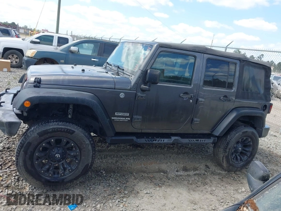 2017 Jeep Wrangler Unlimited Sport with VIN 1C4BJWDG6HL517779, listed as a IAAI auction lot 42134534 with 128,701 mi miles and . Bid and sale history available at DreamBid. Image 13.