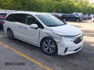 2022 Honda Odyssey Touring with VIN 5FNRL6H88NB026592, listed as a IAAI auction lot 42367048 with 57,066 mi miles and . Bid and sale history available at DreamBid. Image 1.