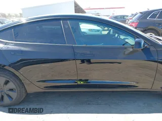 2025 Tesla Model 3 Long Range with VIN 5YJ3E1EA5SF919681, listed as a IAAI auction lot 41818042 with 2,173 mi miles and . Bid and sale history available at DreamBid. Image 14.