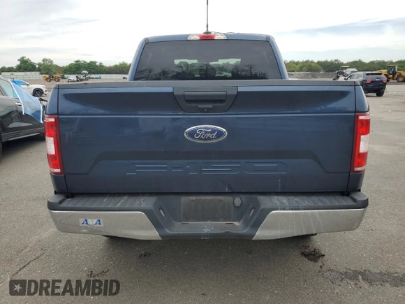 2019 Ford F-150 XL with VIN 1FTEW1E55KFC10642, listed as a Copart auction lot 62811755 with 128,286 mi miles and Salvage title. Bid and sale history available at DreamBid. Image 6.