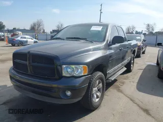 2002 Dodge 1500 with VIN 1D7HU18NX2S607033, listed as a IAAI auction lot 41644160 with 143,736 mi miles and . Bid and sale history available at DreamBid. Image 2.