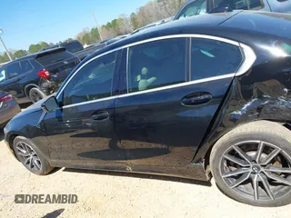 2021 BMW 3 Series 330i с VIN 3MW5R1J0XM8B69340, выставлен на аукционе IAAI как лот 41864211 с пробегом 63 614 миль миль и . История ставок и продаж доступна на DreamBid. Изображение 14.