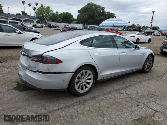 2015 Tesla Model S 85D with VIN 5YJSA1H28FFP78686, listed as a Copart auction lot 53310595 with 69,682 mi miles and Salvage Title. Bid and sale history available at carsss.com. Image 3.