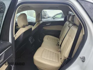 2019 Ford Edge SEL z VIN 2FMPK3J90KBC64372, wystawiony jako IAAI lot #42239886 z przebiegiem 86 260 mil mil oraz . Historia ofert i sprzedaży dostępna na DreamBid. Obrazek 1.