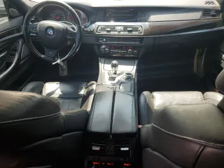 2013 BMW M5 z VIN WBSFV9C56DC774094, wystawiony jako Copart lot #55302565 z przebiegiem 100 605 mil mil oraz Tytuł czysty. Historia ofert i sprzedaży dostępna na DreamBid. Obrazek 8.