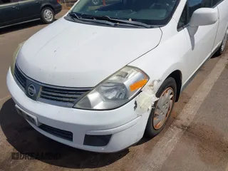 2009 Nissan Versa 1.8 S with VIN 3N1BC11E99L371998, listed as a IAAI auction lot 41723771 with 130,172 mi miles. Bid and sale history available at carsss.com. Image 6.