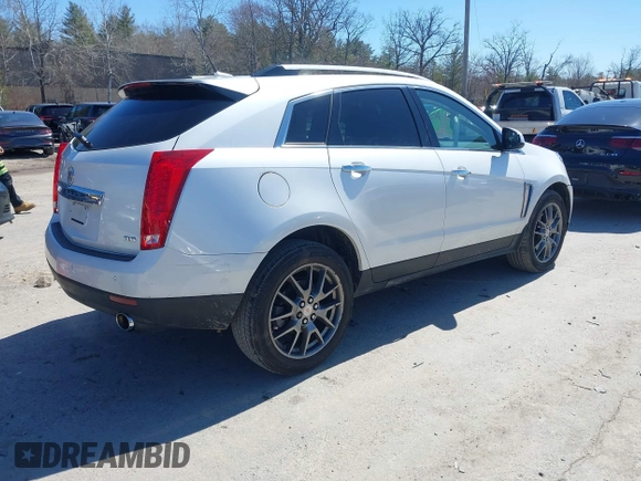 2013 Cadillac SRX Performance Collection with VIN 3GYFNDE33DS637155, listed as a IAAI auction lot 41977706 with 140,668 mi miles and . Bid and sale history available at DreamBid. Image 4.