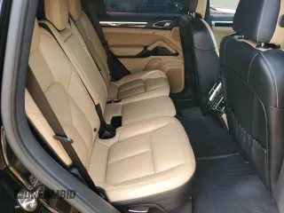 2018 Porsche Cayenne with VIN WP1AA2A27JKA06735, listed as a Copart auction lot 59016435 with 96,559 mi miles and Salvage title. Bid and sale history available at DreamBid. Image 11.