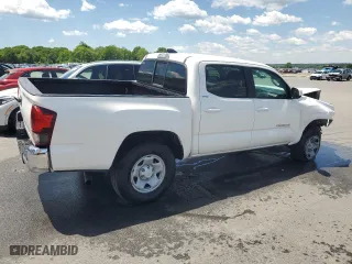 2023 Toyota Tacoma 2WD SR with VIN 3TYAX5GN0PT068597, listed as a Copart auction lot 57196314 with 31,998 mi miles and Clean Title. Bid and sale history available at carsss.com. Image 3.