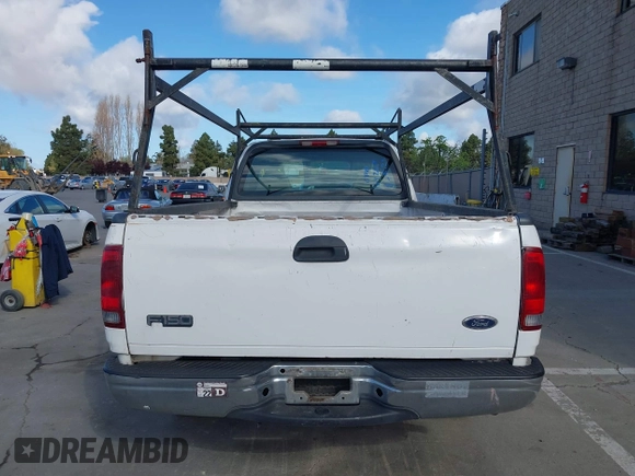 2000 Ford F-150 XL with VIN 1FTRF17WXYKA72880, listed as a IAAI auction lot 41989317 with 149,967 mi miles. Bid and sale history available at carsss.com. Image 16.