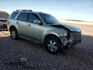 2010 Ford Escape Limited with VIN 1FMCU9EG9AKB92211, listed as a Copart auction lot 64062905 with 180,721 mi miles and Salvage title. Bid and sale history available at DreamBid. Image 4.