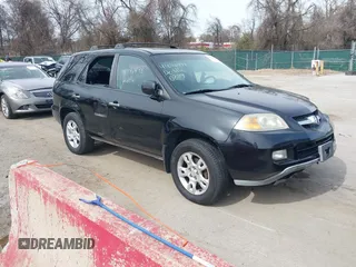 2005 Acura MDX Touring with VIN 2HNYD18875H513766, listed as a IAAI auction lot 41846498 with 144,550 mi miles. Bid and sale history available at carsss.com. Image 1.
