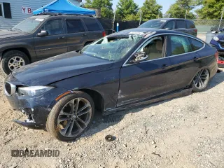 2018 BMW 3 Series 330i xDrive with VIN WBA8Z9C55JB220144, listed as a Copart auction lot 70318254 with 72,145 mi miles and Salvage Title. Bid and sale history available at carsss.com. Image 1.