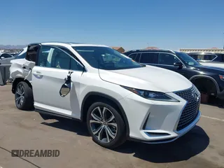 2021 Lexus RX 450h z VIN 2T2HGMDA6MC070828, wystawiony jako IAAI lot #42315470 z przebiegiem 19 853 mil mil oraz . Historia ofert i sprzedaży dostępna na DreamBid. Obrazek 1.