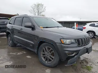 2016 Jeep Grand Cherokee Laredo z VIN 1C4RJFAG7GC475740, wystawiony jako IAAI lot #41967857 z przebiegiem 96 049 mil mil oraz . Historia ofert i sprzedaży dostępna na DreamBid. Obrazek 1.