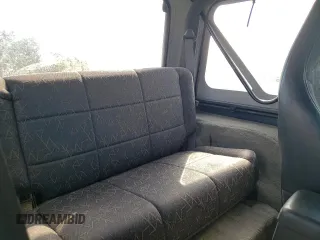 2002 Jeep Wrangler Sport с VIN 1J4FA49S02P734712, выставлен на аукционе Copart как лот 63310225 с пробегом 178 367 миль миль и Чистый • Clean title. История ставок и продаж доступна на DreamBid. Изображение 11.