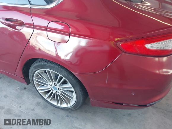 2013 Ford Fusion SE Hybrid z VIN 3FA6P0LU9DR183625, wystawiony jako IAAI lot #42338533 z przebiegiem 159 546 mil mil oraz . Historia ofert i sprzedaży dostępna na DreamBid. Obrazek 6.