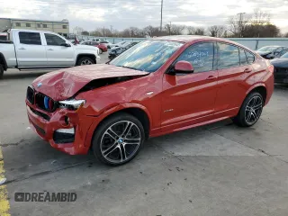 2018 BMW X4 xDrive28i with VIN 5UXXW3C54J0Y65902, listed as a Copart auction lot 73502642 with 35,029 mi miles. Bid and sale history available at carsss.com. Image 1.