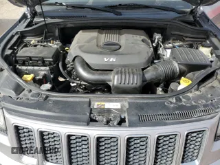 2014 Jeep Grand Cherokee Overland with VIN 1C4RJFCG4EC326325, listed as a Copart auction lot 49166645 with 128,261 mi miles and Salvage Title. Bid and sale history available at DreamBid. Image 12.