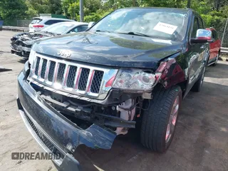 2013 Jeep Grand Cherokee Overland with VIN 1C4RJECT3DC526005, listed as a IAAI auction lot 42064151 with 112,777 mi miles and . Bid and sale history available at DreamBid. Image 6.