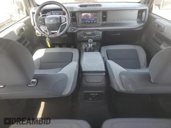 2023 Ford Bronco with VIN 1FMDE5CH2PLA96705, listed as a Copart auction lot 60813415 with 14,760 mi miles and Salvage title. Bid and sale history available at DreamBid. Image 8.