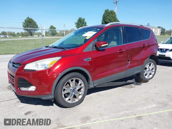 2015 Ford Escape Titanium with VIN 1FMCU9J92FUA53699, listed as a IAAI auction lot 40500310 with 197,581 mi miles. Bid and sale history available at carsss.com. Image 20.