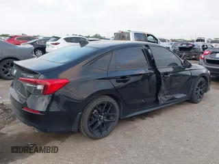 2022 Honda Civic Sport z VIN 2HGFE2F56NH583737, wystawiony jako IAAI lot #42063718 z przebiegiem 42 952 mil mil oraz . Historia ofert i sprzedaży dostępna na DreamBid. Obrazek 4.