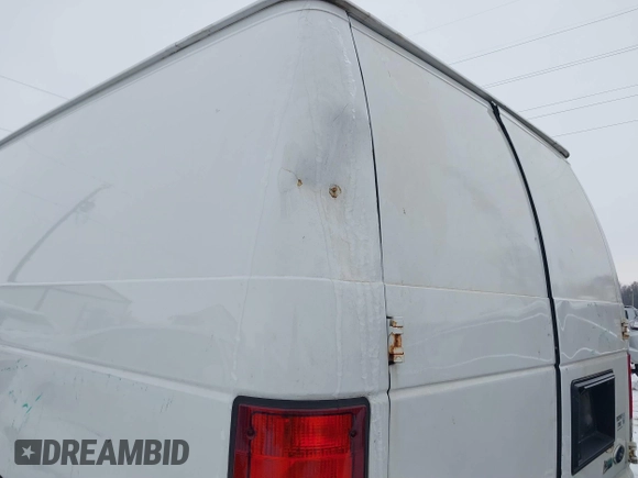 2014 Ford Econoline Cargo Super Duty Commercial with VIN 1FTSE3EL5EDA27709, listed as a IAAI auction lot 41215241 with 214,536 mi miles and . Bid and sale history available at carsss.com. Image 6.