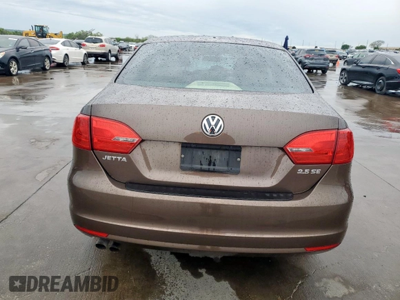 2013 Volkswagen Jetta SE with VIN 3VWDX7AJ9DM443065, listed as a Copart auction lot 51006995 with 93,981 mi miles and Salvage title. Bid and sale history available at DreamBid. Image 6.