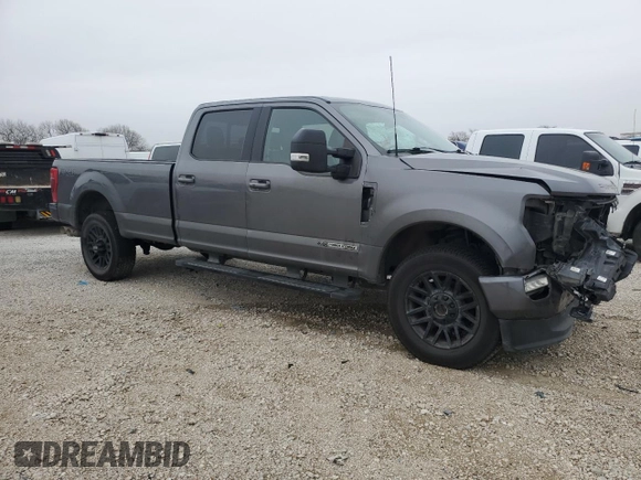 2021 Ford F-350 XL with VIN 1FT8W3BT0MEE06413, listed as a Copart auction lot 42080395 with 140,610 mi miles and Salvage title. Bid and sale history available at DreamBid. Image 4.