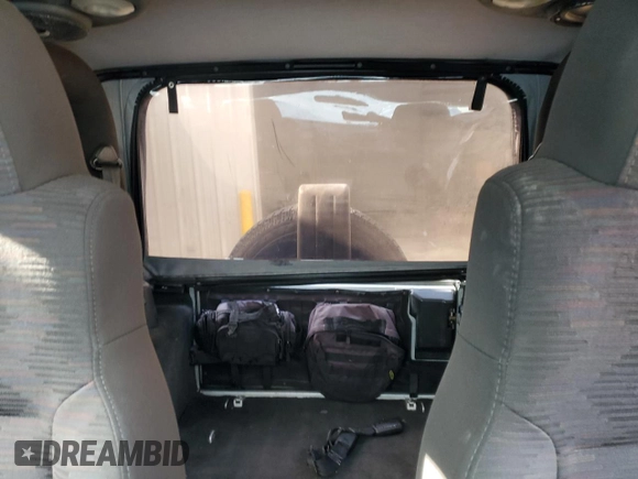 2004 Jeep Wrangler X with VIN 1J4FA39S74P763492, listed as a Copart auction lot 54664095 with 168,493 mi miles and Salvage Title. Bid and sale history available at DreamBid. Image 10.