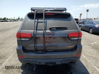 2019 Jeep Grand Cherokee Trailhawk z VIN 1C4RJFLG6KC759527, wystawiony jako Copart lot #64862645 z przebiegiem 76 079 mil mil oraz Szkoda całkowita • Salvage title. Historia ofert i sprzedaży dostępna na DreamBid. Obrazek 6.