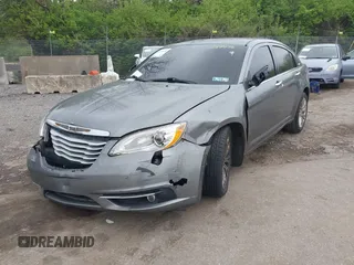 2011 Chrysler 200 Limited with VIN 1C3BC2FG9BN588636, listed as a IAAI auction lot 42050924 with 180,526 mi miles and . Bid and sale history available at DreamBid. Image 14.