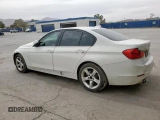 2013 BMW 3 Series 328i xDrive with VIN WBA3B3C51DF540084, listed as a Copart auction lot 56930105 with 117,567 mi miles and Salvage title. Bid and sale history available at DreamBid. Image 2.