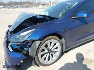 2022 Tesla Model 3 Long Range with VIN 5YJ3E1EB0NF191717, listed as a IAAI auction lot 41722202 with 67,811 mi miles. Bid and sale history available at carsss.com. Image 21.