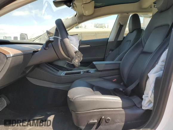 2023 Tesla Model 3 with VIN 5YJ3E1EA7PF488316, listed as a Copart auction lot 49655325 with 60,589 mi miles and Salvage Title. Bid and sale history available at DreamBid. Image 7.