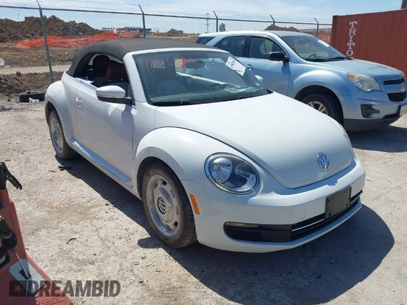 2015 Volkswagen Beetle 1.8T w/Tech with VIN 3VW517AT9FM810122, listed as a IAAI auction lot 41815980 with 72,420 mi miles and . Bid and sale history available at DreamBid. Image 1.