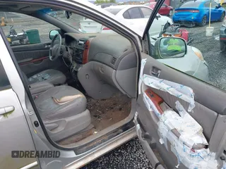 2004 Toyota Sienna XLE with VIN 5TDZA22C14S076563, listed as a IAAI auction lot 41980606 with 195,007 mi miles. Bid and sale history available at carsss.com. Image 5.