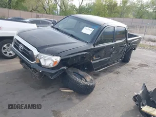 2013 Toyota Tacoma with VIN 5TFLU4EN9DX073331, listed as a IAAI auction lot 42123968 with 145,879 mi miles and . Bid and sale history available at DreamBid. Image 2.